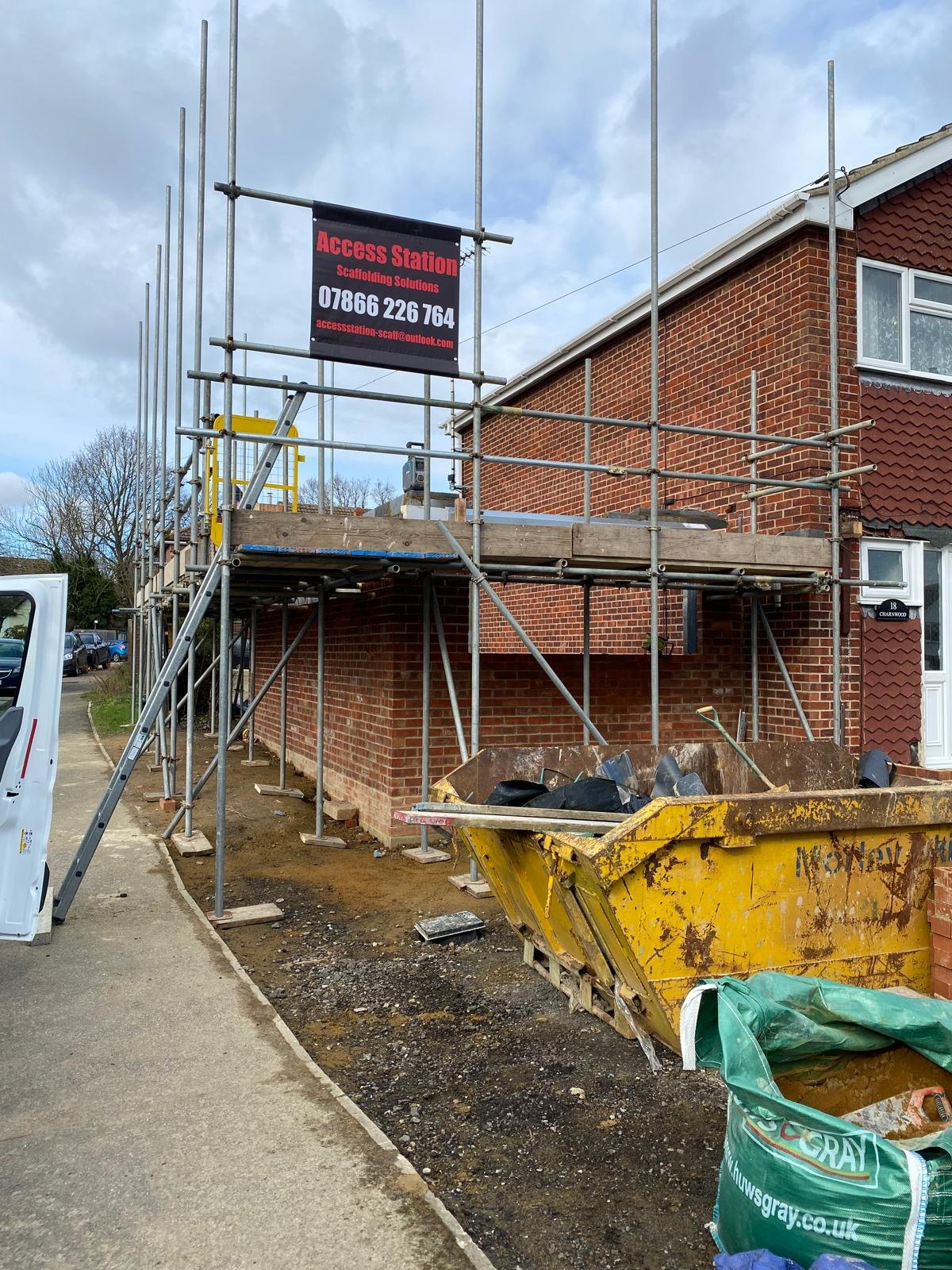 Access Station scaffolding with company site sign
